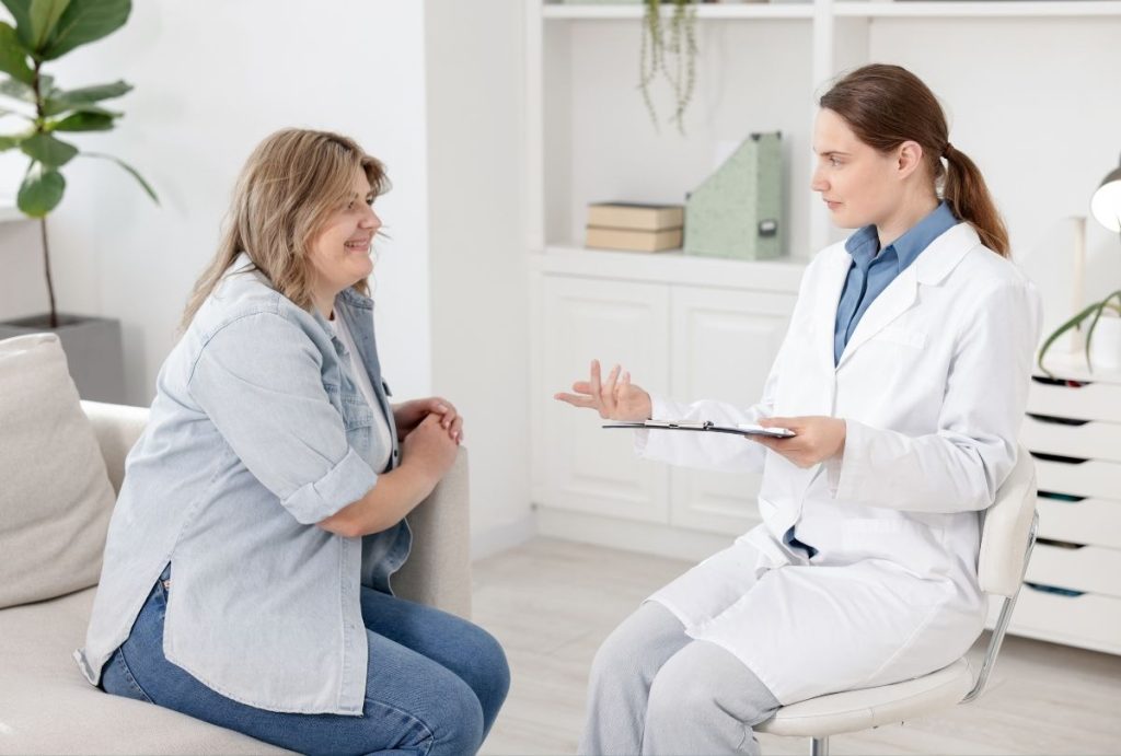 Weight loss shots Houston—patient consults with healthcare provider to explore personalized weight management options.