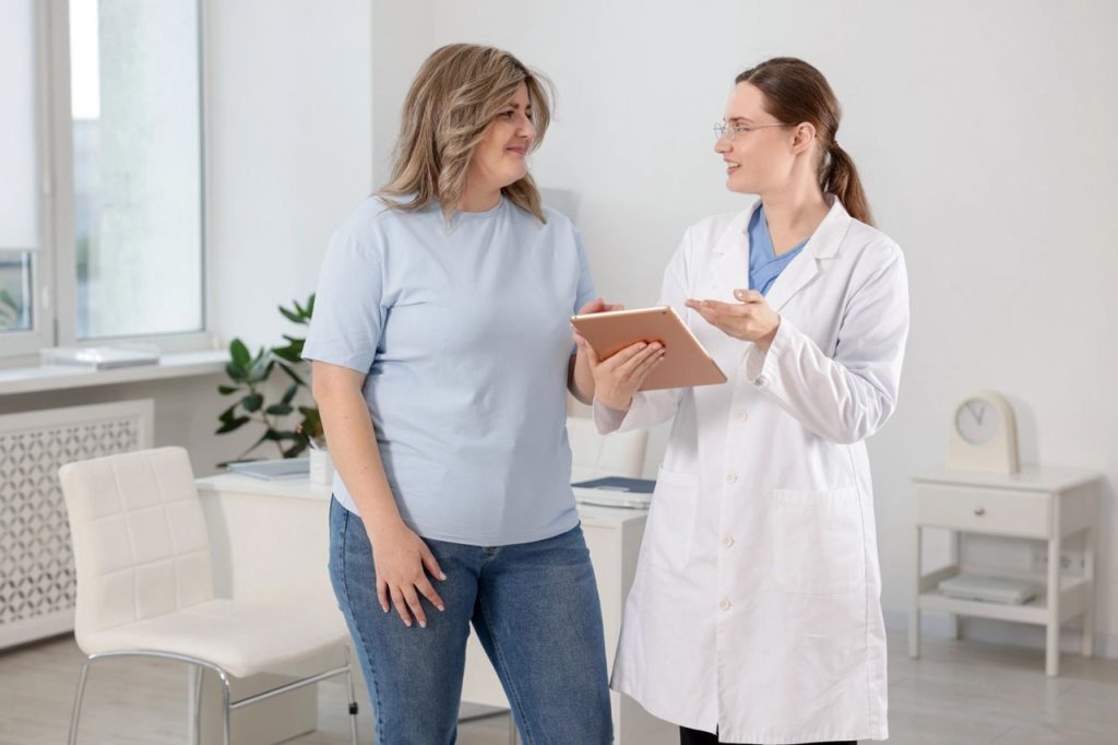 Doctor showing a patient on a tablet how long the Wegovy Houston weight loss medication takes to work effectively.