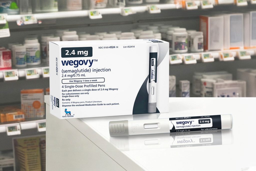 Wegovy 2.4 mg weekly injection pen and box on pharmacy shelf, weight management available at Wegovy Houston clinic.